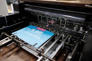 A die cutting in progress as part of print finishing services in Euclid, OH